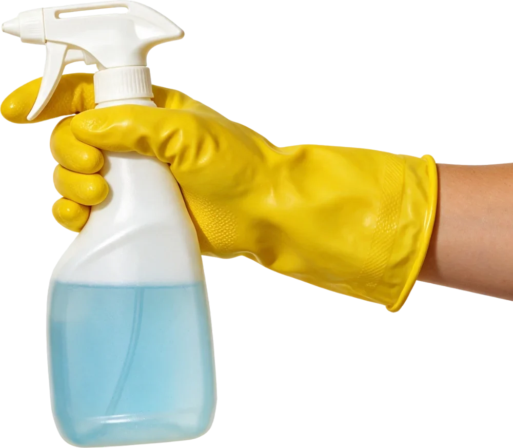 Fabby Cleaning Services spray bottle held by a yellow-gloved hand